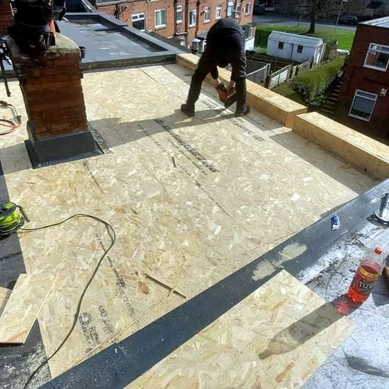 Before, felt flat roof in woodhouse