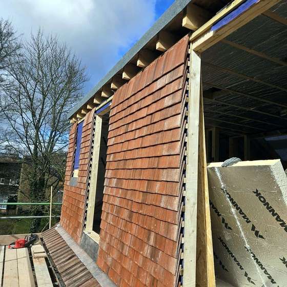 The tiled dormer cheek
