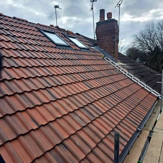 Two roof windows in the tiled front roof of our Roundhay dormer project